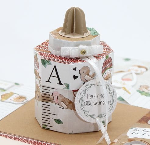 <img src="PG19-Eule.jpg" width="100%" height="auto" alt="Explosionsbox Eule mit Babyflasche als Mini-Box" rel="nofollow noindex">